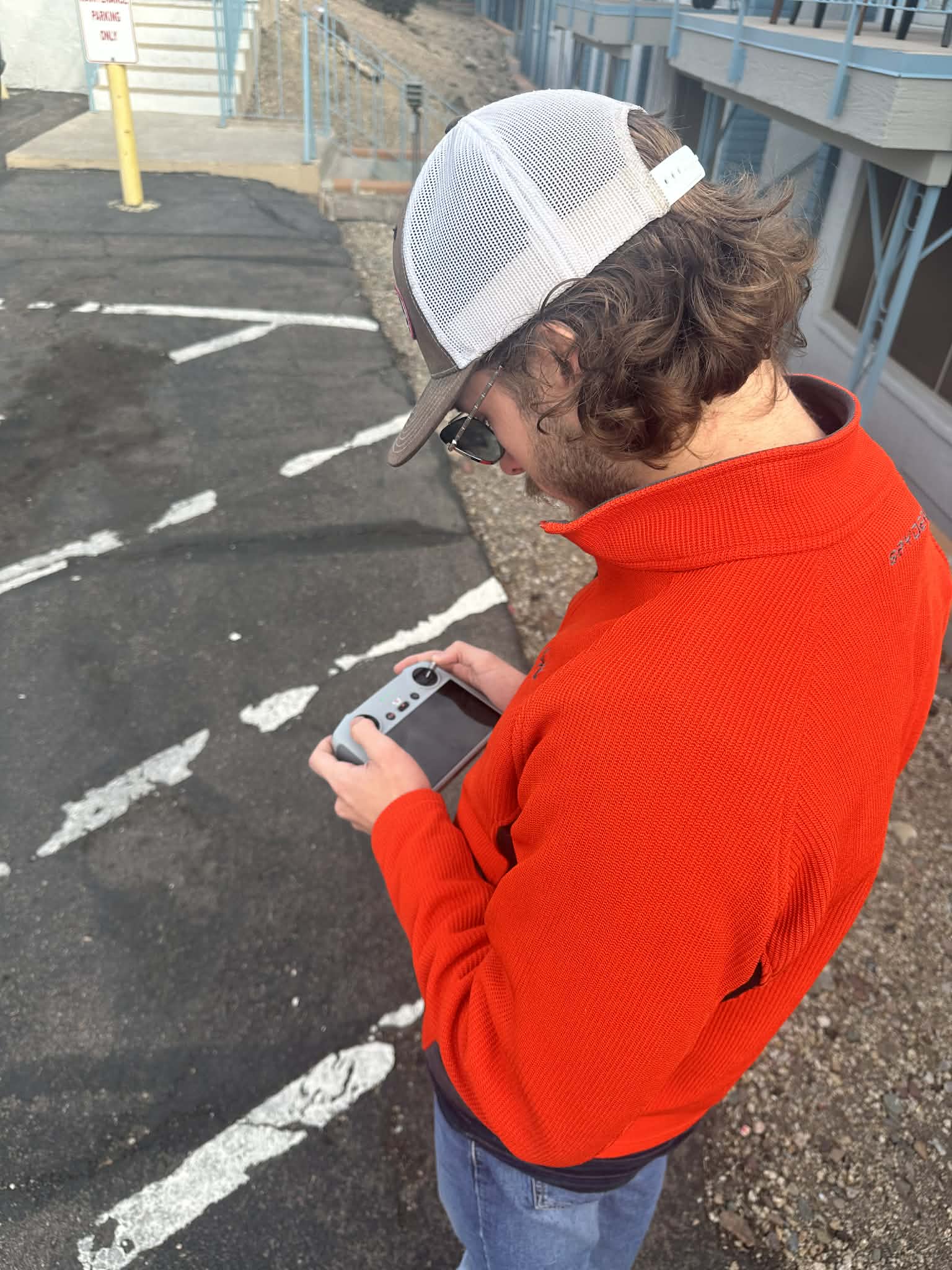 Drone pilot operating inspection drone