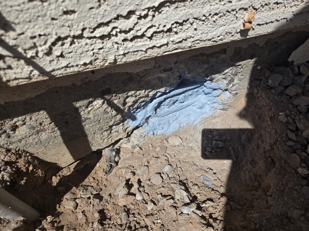 Exposed steel coated with anti-corrosion bonding agent before mortar repair